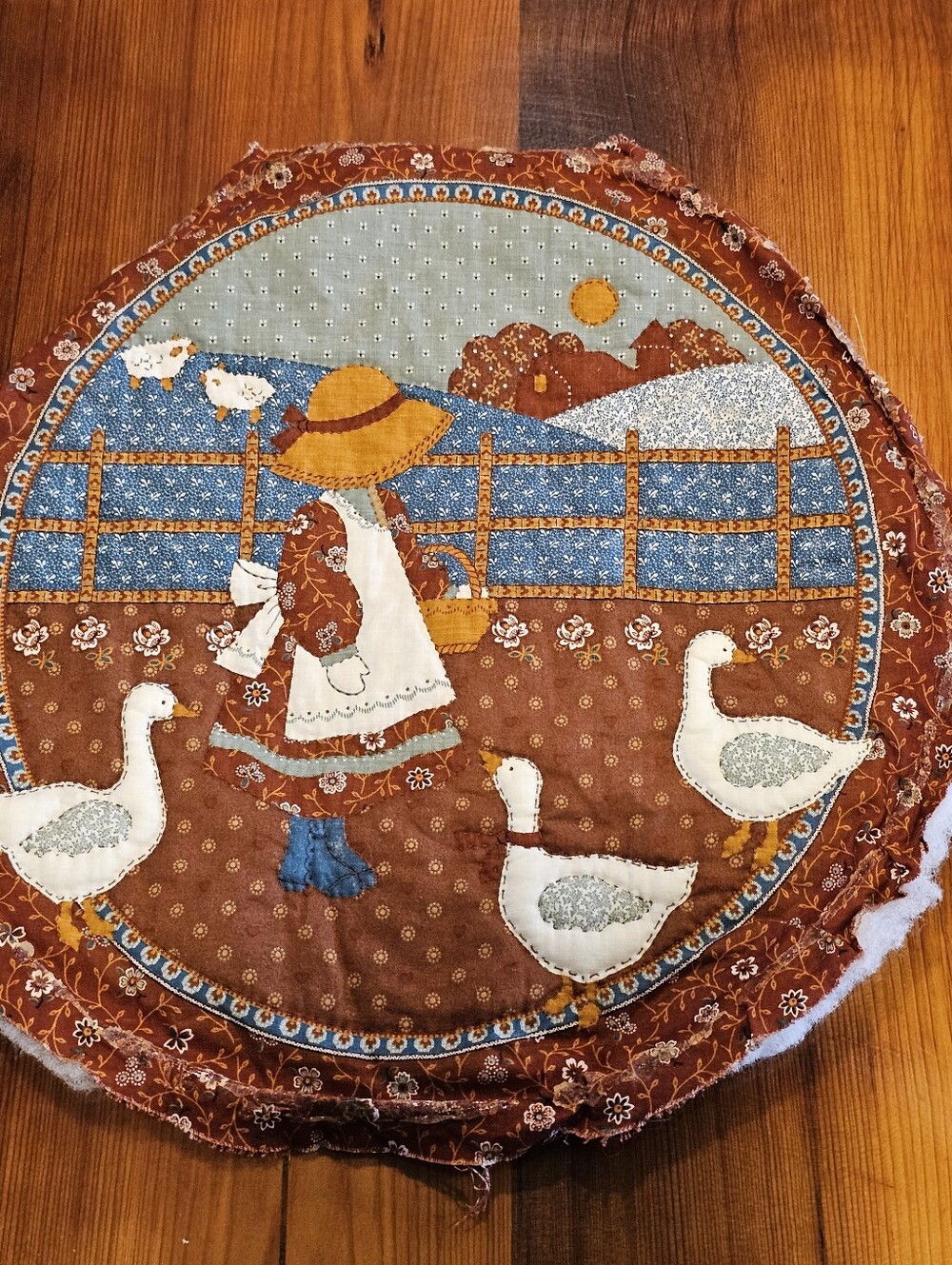 Handmade Farm Girl Quilted Round Mat in Brown and Blue